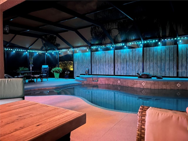 view of patio with a lanai