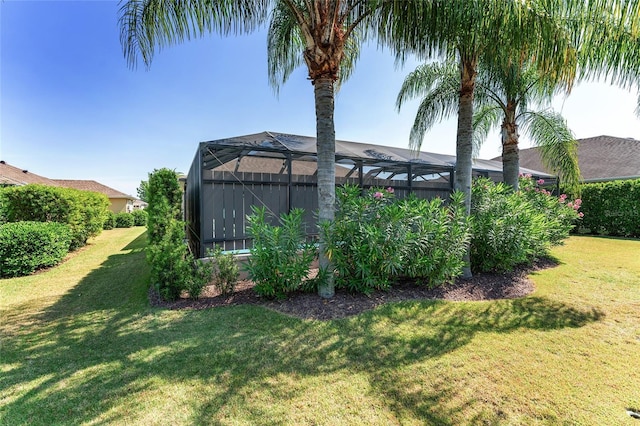 view of yard with a lanai