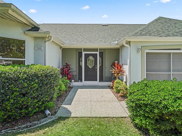 property entrance with a garage