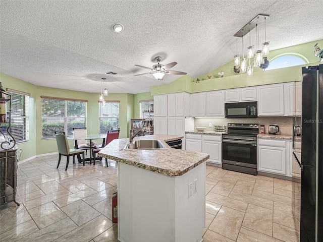 kitchen with black appliances, white cabinetry, sink, pendant lighting, and light tile floors