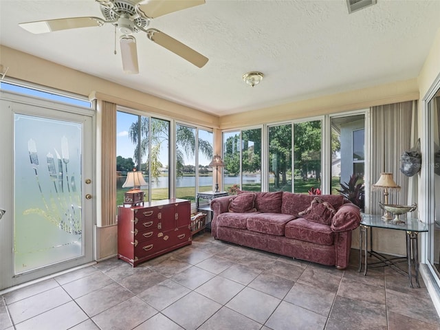 sunroom / solarium with ceiling fan