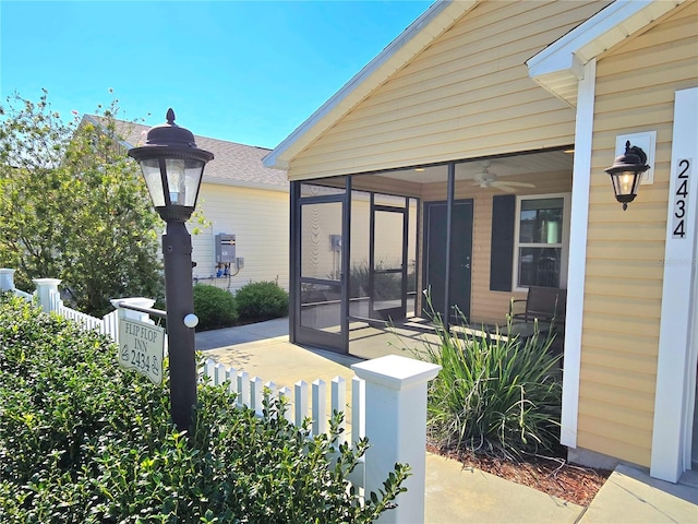 exterior space featuring a sunroom