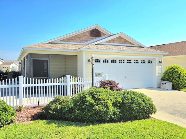 view of front of property with a garage