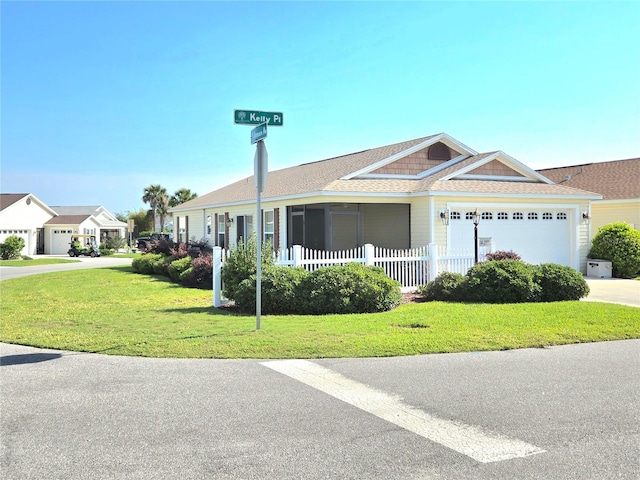 single story home with a front yard