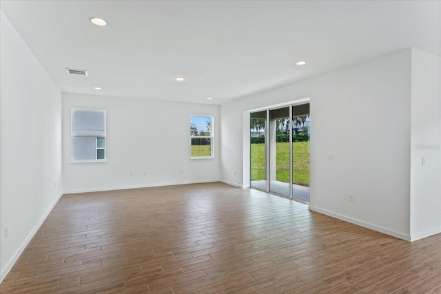 empty room featuring hardwood / wood-style flooring