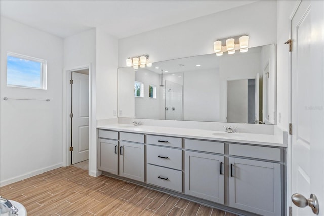 bathroom with dual vanity