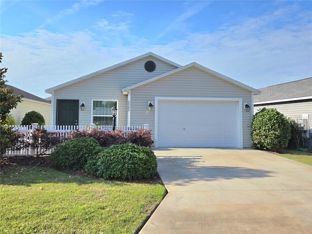 ranch-style house featuring a garage