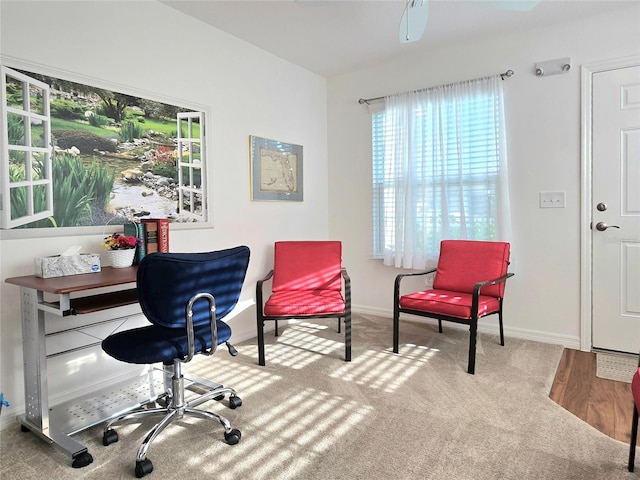 home office featuring ceiling fan and carpet flooring