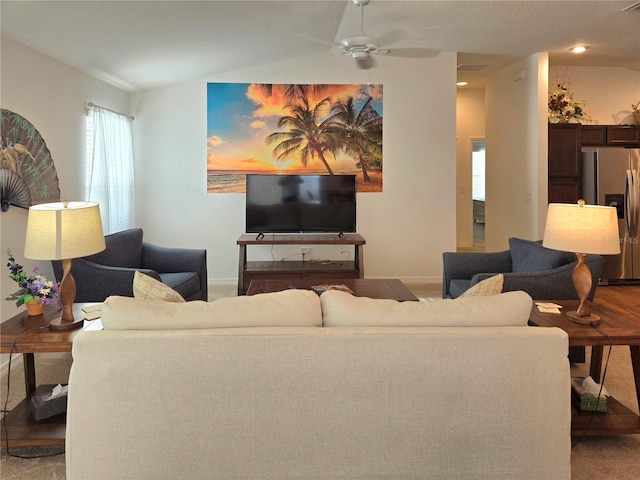 living room with lofted ceiling and ceiling fan