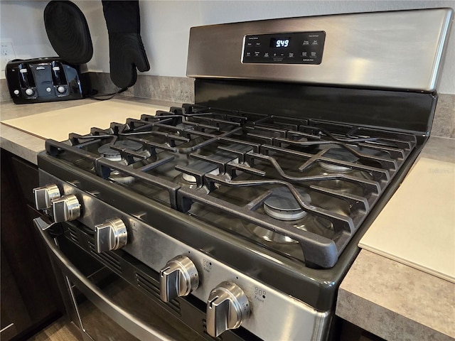 room details with stainless steel gas stove