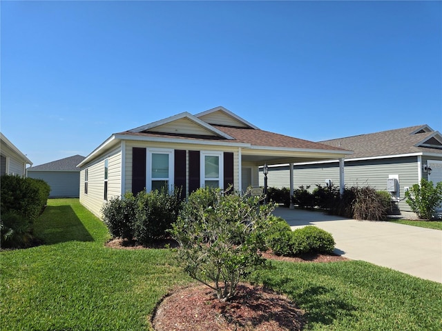 ranch-style house with a front lawn and a carport