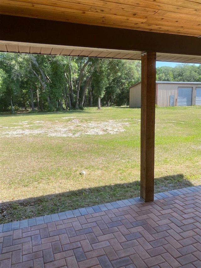 view of yard with a patio area