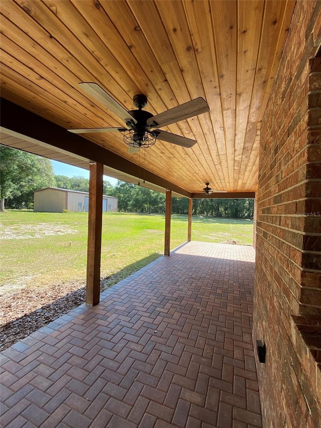 view of patio featuring ceiling fan