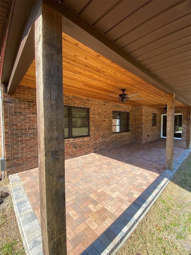 view of patio with ceiling fan