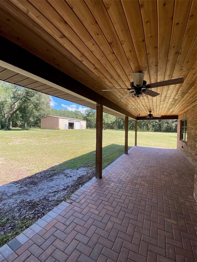 view of patio featuring ceiling fan