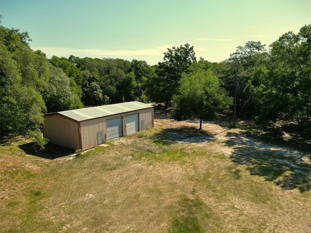 view of outbuilding with a garage