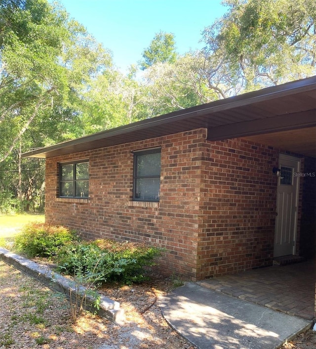 1921 Smitty Rd, Weirsdale, FL 32195 - view of property exterior with brick siding