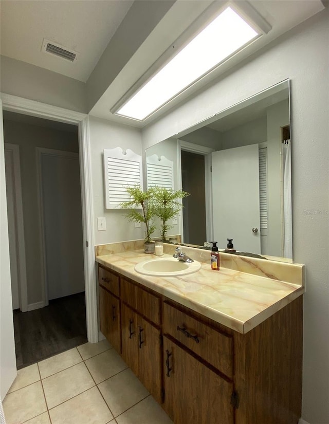 bathroom featuring vanity and tile patterned floors