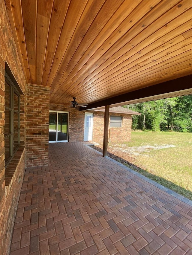 view of patio / terrace featuring ceiling fan