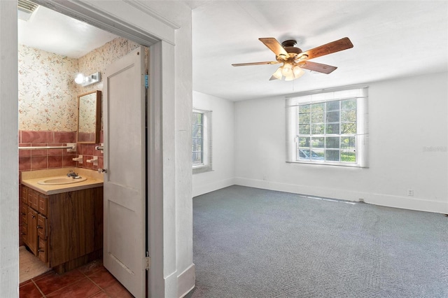 bathroom with vanity and ceiling fan