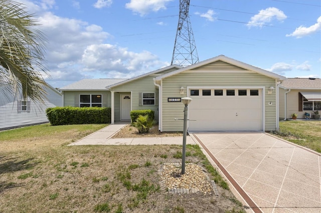 single story home with a garage and a front yard