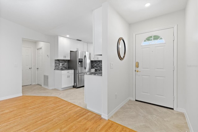 entrance foyer with light hardwood / wood-style floors