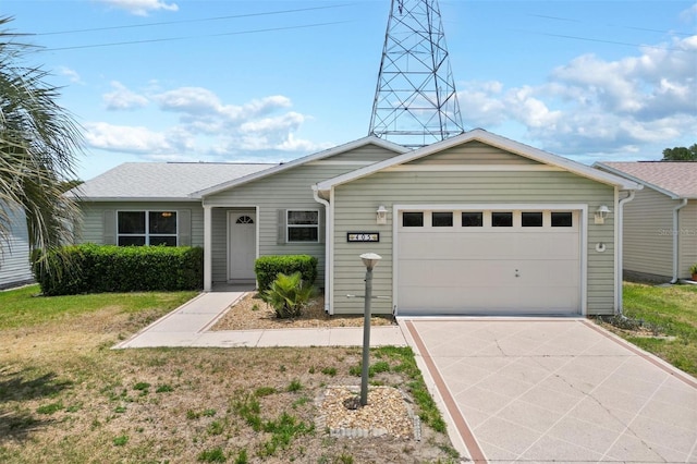 ranch-style house with a front lawn and a garage