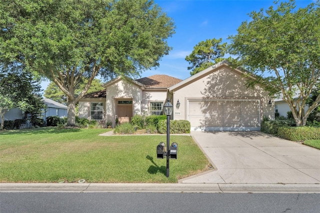 ranch-style house featuring a garage and a front yard