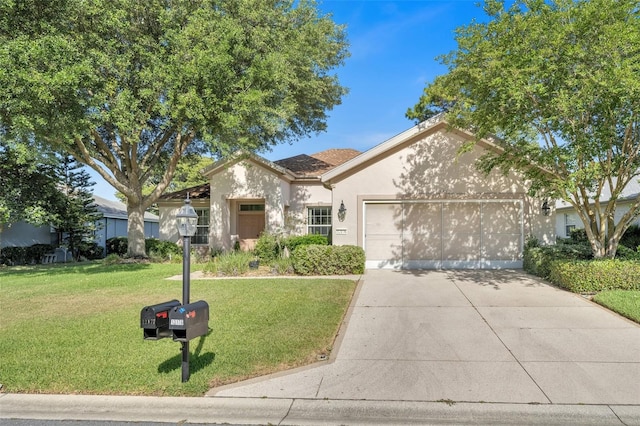 ranch-style house featuring a garage and a front lawn