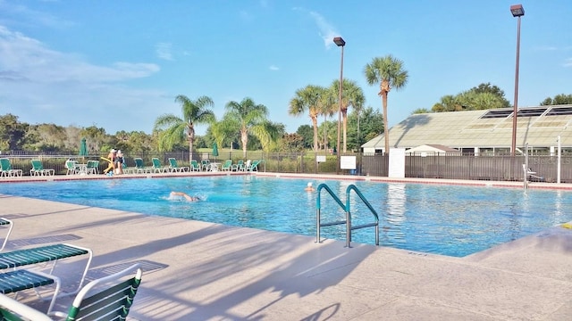 view of pool featuring a patio area