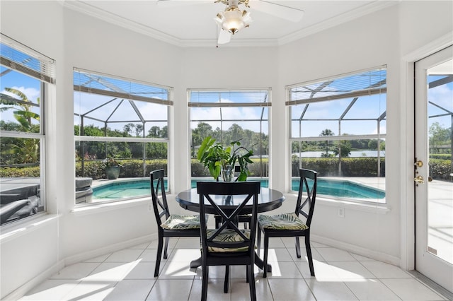 sunroom featuring ceiling fan