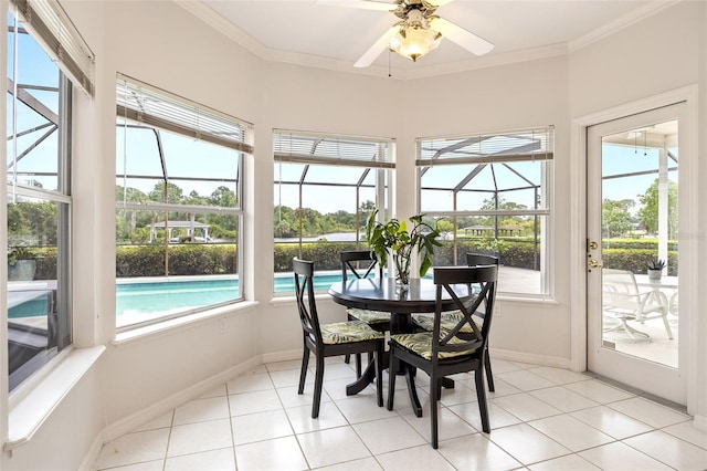 sunroom / solarium with ceiling fan