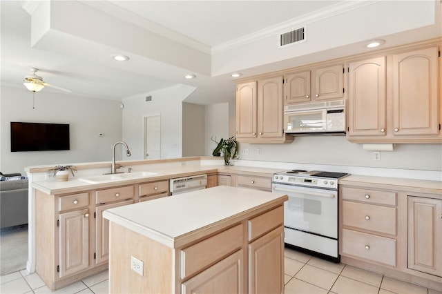 kitchen featuring ceiling fan, light brown cabinetry, sink, white appliances, and light tile flooring