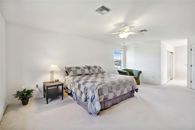 bedroom with ceiling fan and carpet