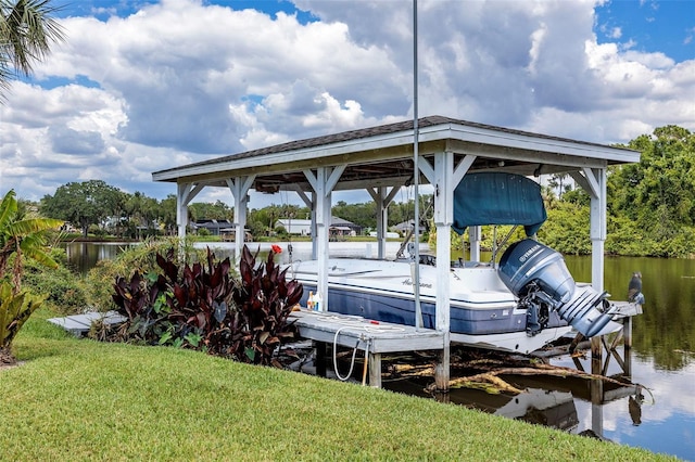 view of dock featuring a water view and a lawn