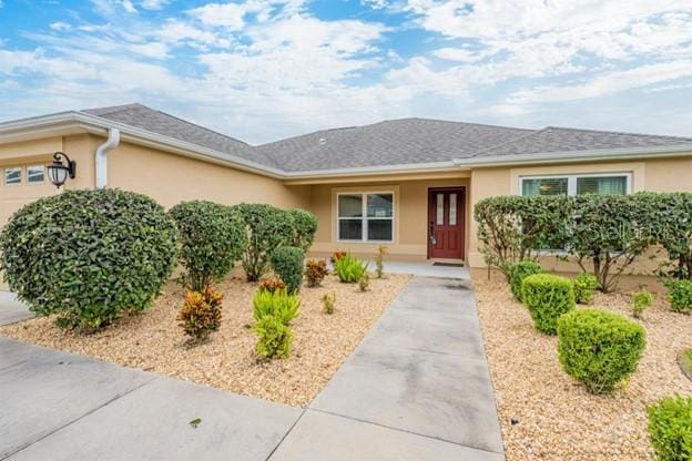 single story home featuring a garage