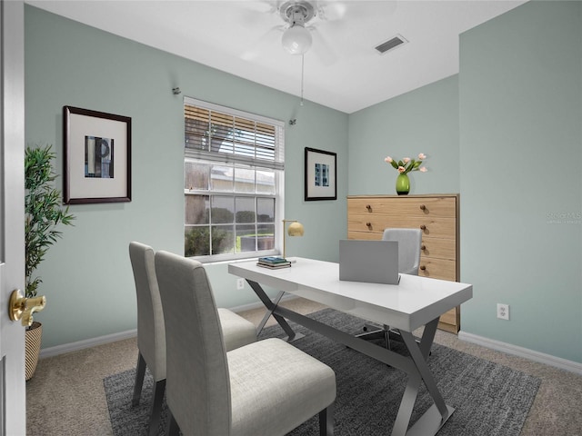 office space with carpet floors, visible vents, and baseboards