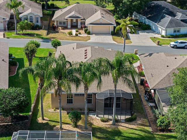 birds eye view of property with a residential view