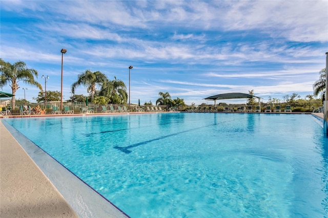 pool featuring fence