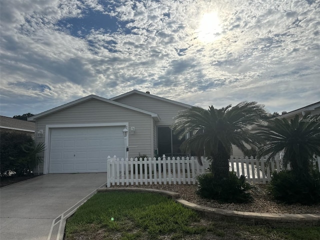 single story home with a garage