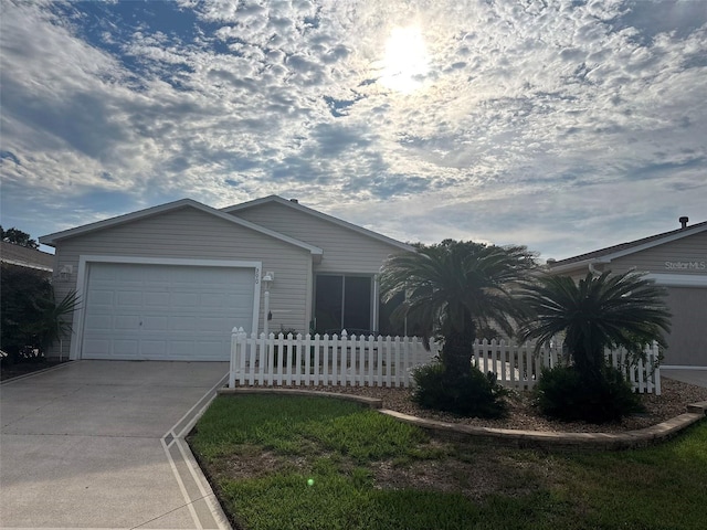 single story home featuring a garage