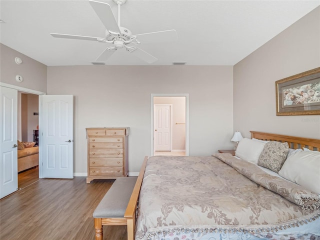 bedroom featuring ceiling fan and hardwood / wood-style flooring