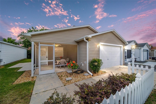 view of front of property featuring a garage