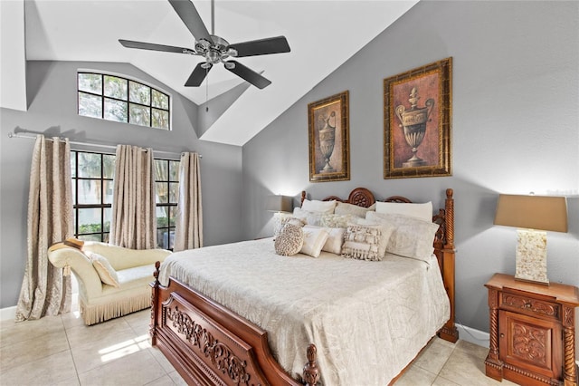 tiled bedroom featuring vaulted ceiling and ceiling fan