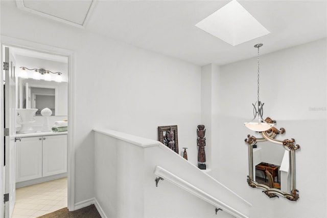 hallway with a skylight