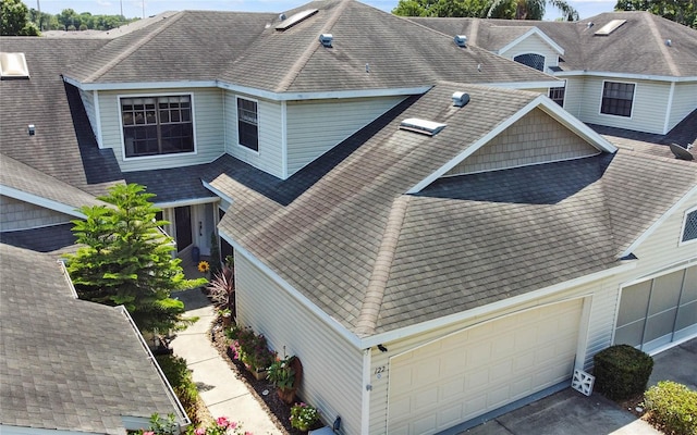 view of side of property featuring a garage