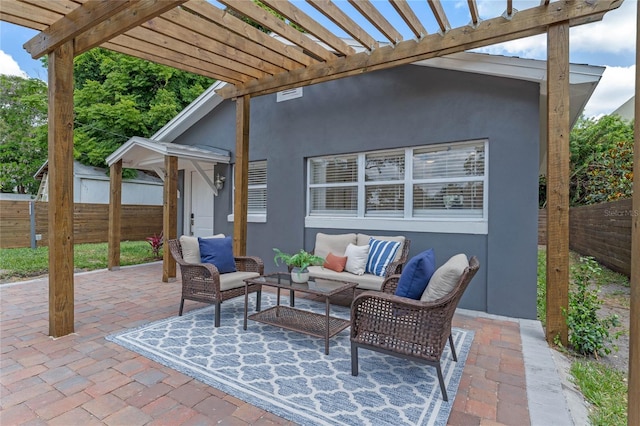 view of patio / terrace with outdoor lounge area and a pergola