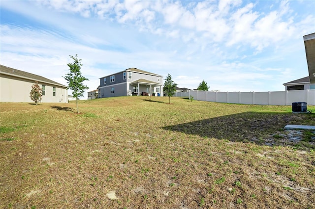 view of yard featuring central AC