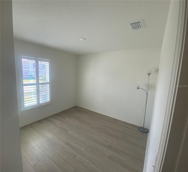 empty room featuring light hardwood / wood-style floors