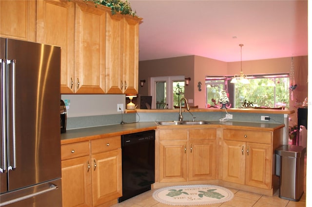 kitchen with black dishwasher, decorative light fixtures, high end fridge, light tile floors, and sink